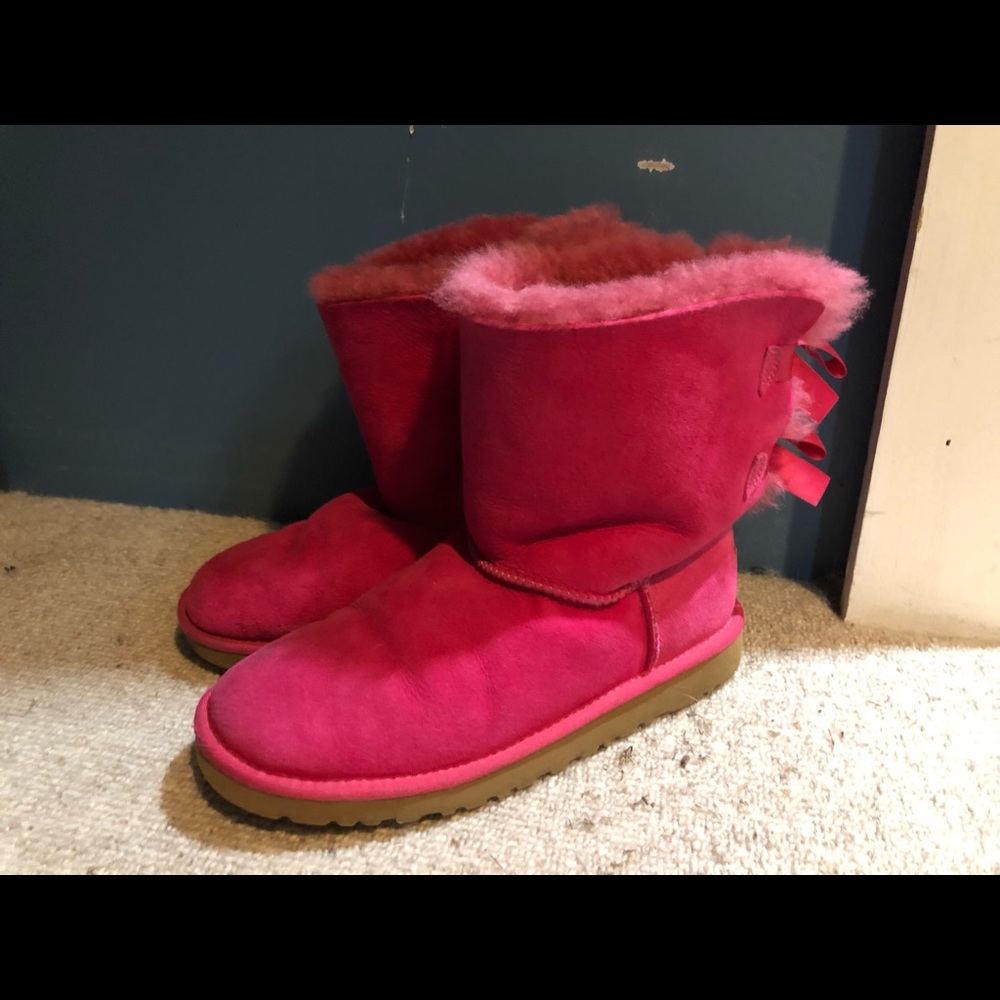 Pink uggs with two bows on back